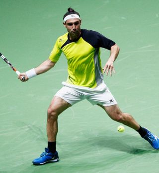 Baghdatis z epsko zaključno žogico (41 udarcev) presenetil favorita