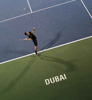 Novak rutinsko čez 1. krog Dubaja, brat Marko izpadel