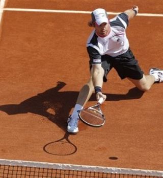 FOTO: Po nervoznem začetku, odličen odpor Kavčiča proti 1. tenisaču sveta Djokoviću!