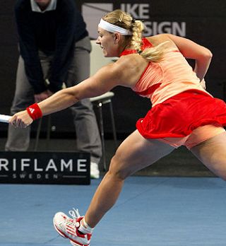 Wozniackijeva premagana v finalu domačega turnirja; Naslov v roke Angelique Kerber