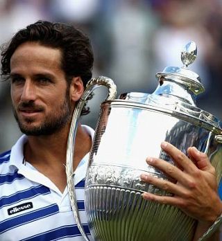 Lopez ubranil Čiliču zaključno žogo in osvojil travnati Aegon Championships