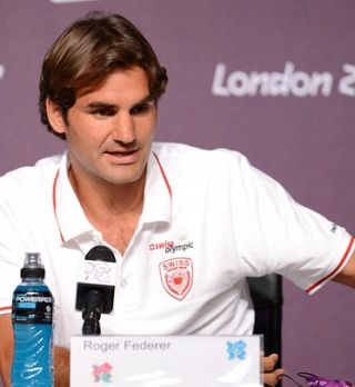 Roger Federer predal čast nošenja zastave in upa na nastop tudi v Riu!