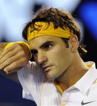 Roger Federer se je rešil šele v 5. nizu po več kot 3 urah igre!