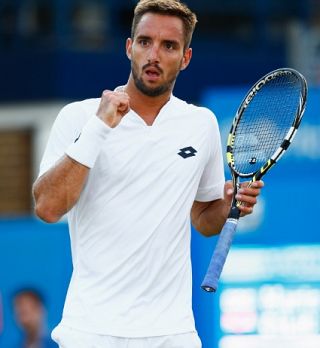 Troicki v Queen'su po Čiliču izločil še Isnerja - naslednji tekmec Andy Murray