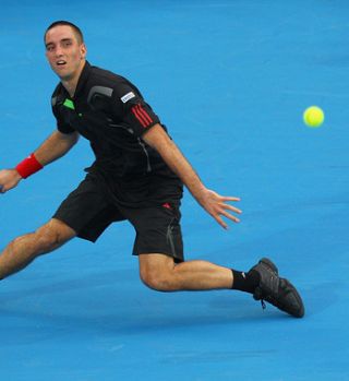 Troicki izločil Hewitta v 1. krogu Sydneya!