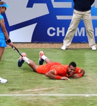 Dodig izločil Tsongo v Queensu; Federer in Nadal v Halleju začela z zmago