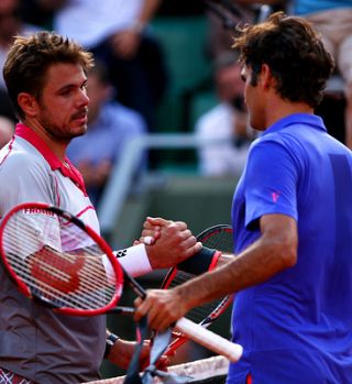 Roland Garros: Federer prvič klonil proti Wawrinki na grand slamih. Tsonga: Roland je t'aime.