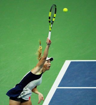 Kerber in Wozniacki v polfinalu OP ZDA, izpad slovenske naveze Srebotnik/Klepač