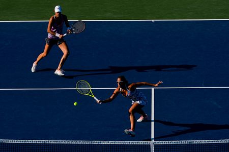 Slovenki v četrtfinalu Grand Slama v New Yorku. Izpad Juvanove med mladinkami.