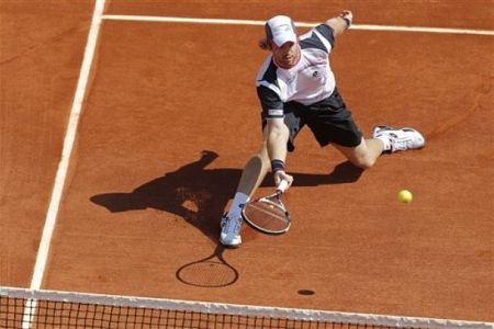 FOTO: Po nervoznem začetku, odličen odpor Kavčiča proti 1. tenisaču sveta Djokoviću!