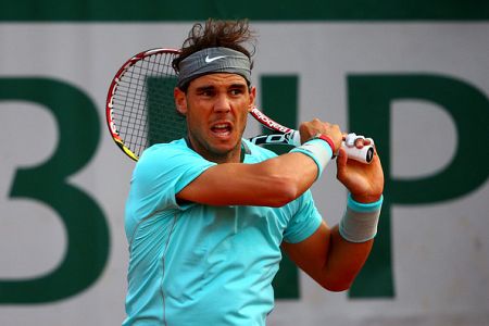 Nadal prešel prvi resen test na letošnjem Roland Garrosu šele v četrtfinalu; Murray ohladil domače gledalce