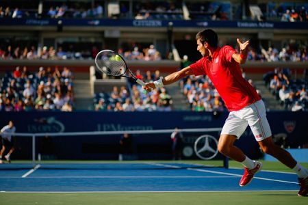 Djokovič povečuje ritem in brani Federerja; Wawrinka izločil Berdycha