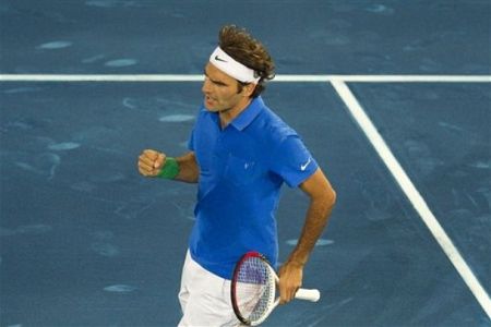 Maestro (Federer) se je rešil skozi šivankino uho; Nadal v slogu peščenega kralja