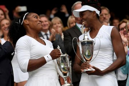 Serena in Venus sta šestič osvojili wimbledonsko krono v dvojicah